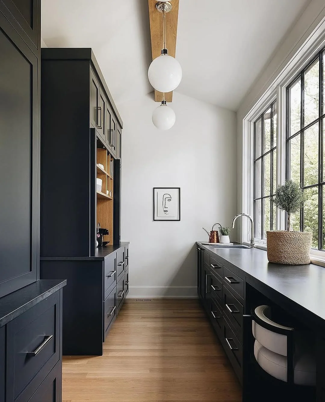 1. Slim Black Cabinetry with Scandinavian Clarity (Dark Cabinets Kitchen Ideas)