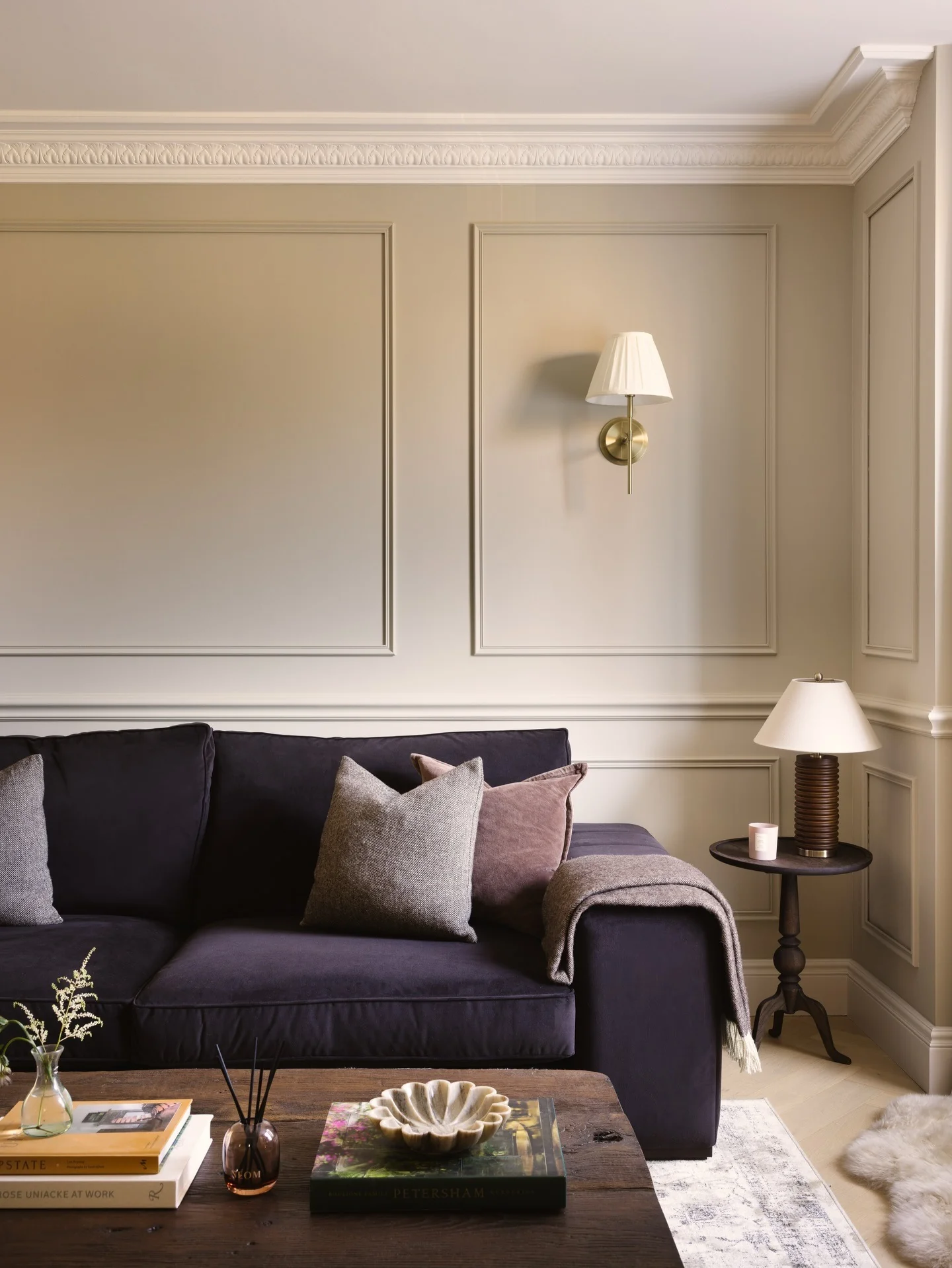 15. Moody Taupe Panelled Living Room With Deep Charcoal Sofa (Contemporary Small Living Room Ideas)