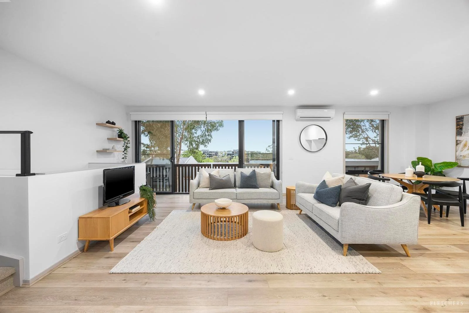 1. Light-Filled Minimalist Lounge with Soft Neutrals (Urban Living Room Ideas)