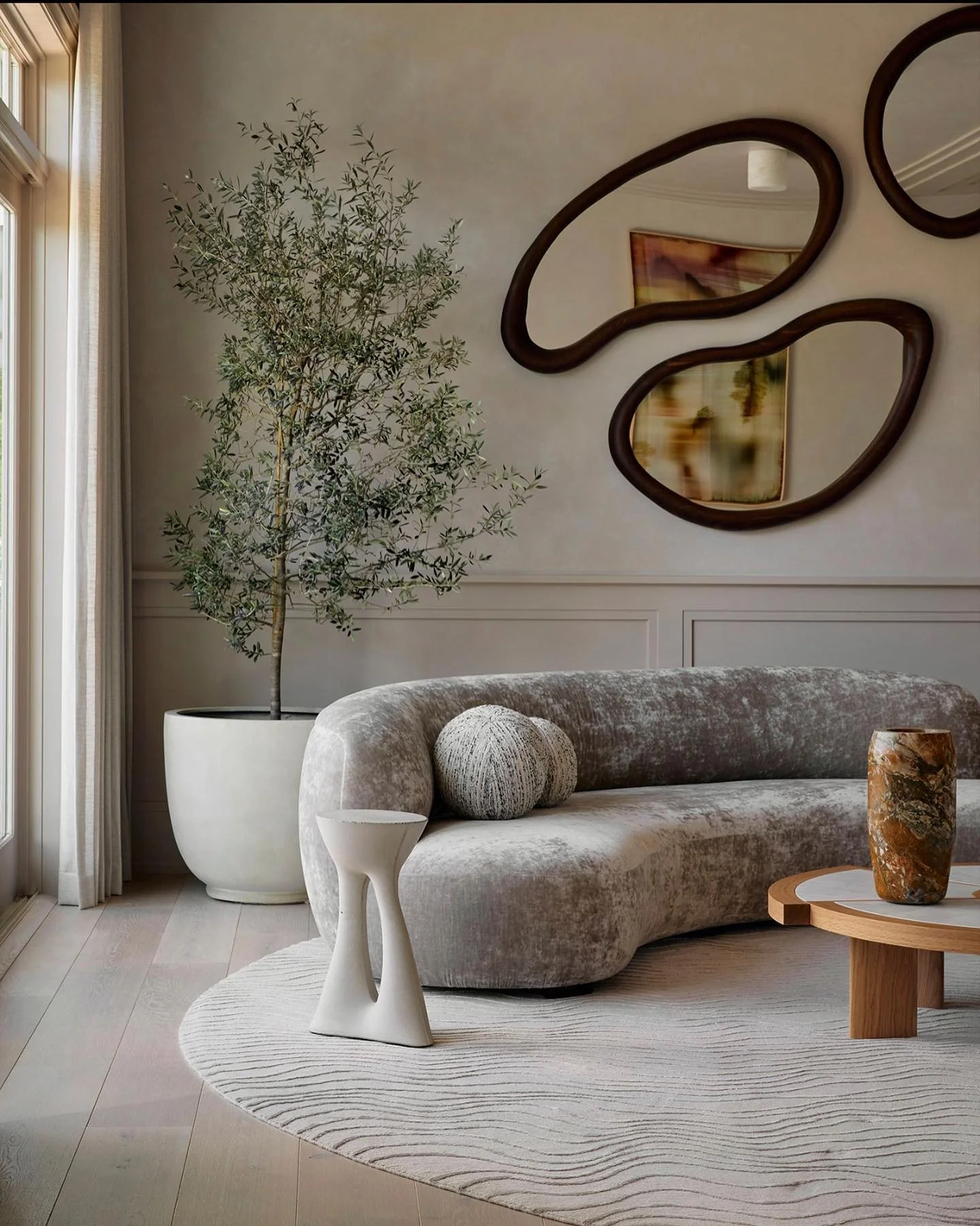 1. Organic Elegance with Abstract Mirrors and Velvet (Mirrors in Living Room Ideas)