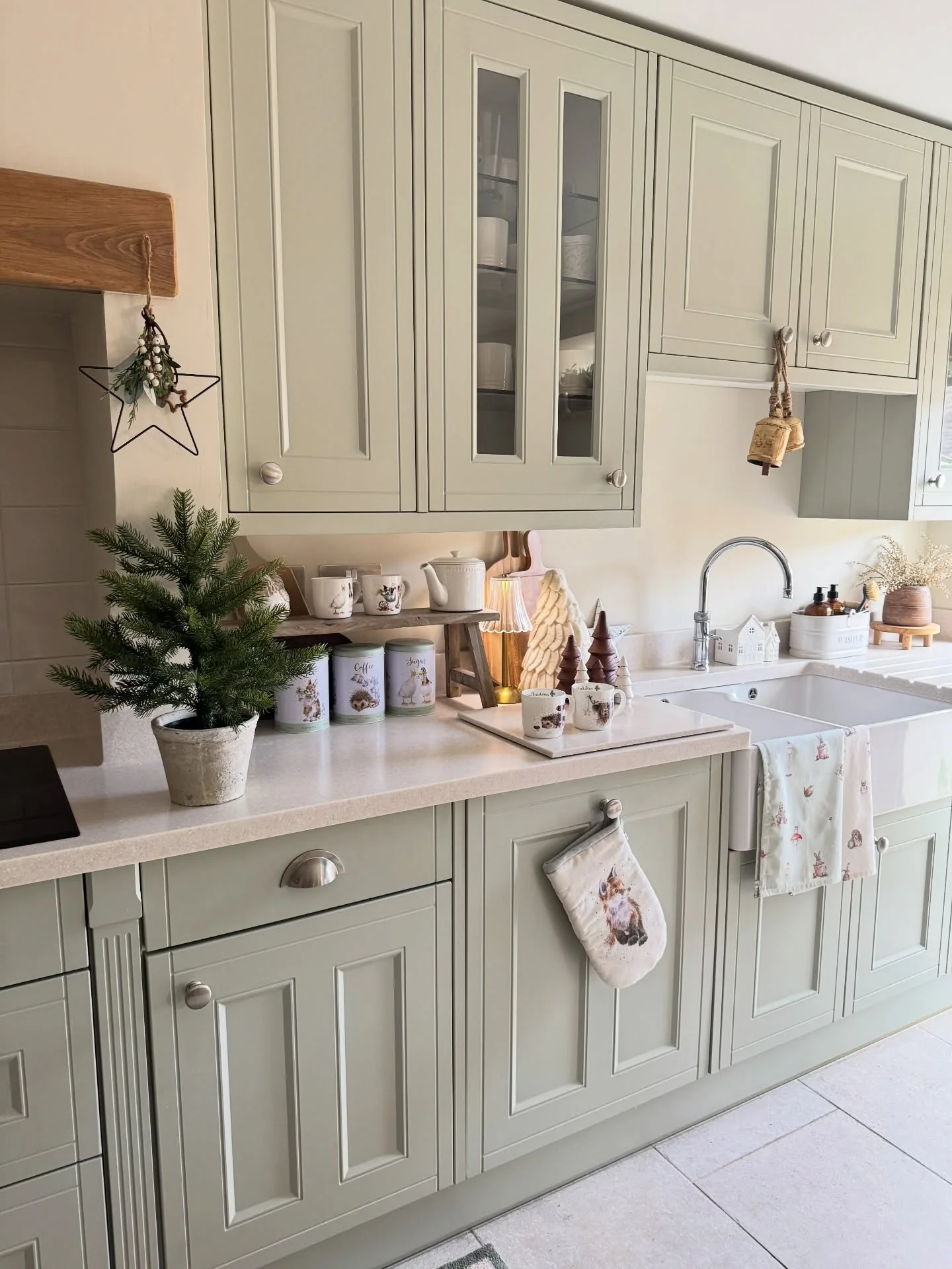 1. Sage Green Shaker Cabinets with Warm White Counters (Small Space Kitchen Ideas)