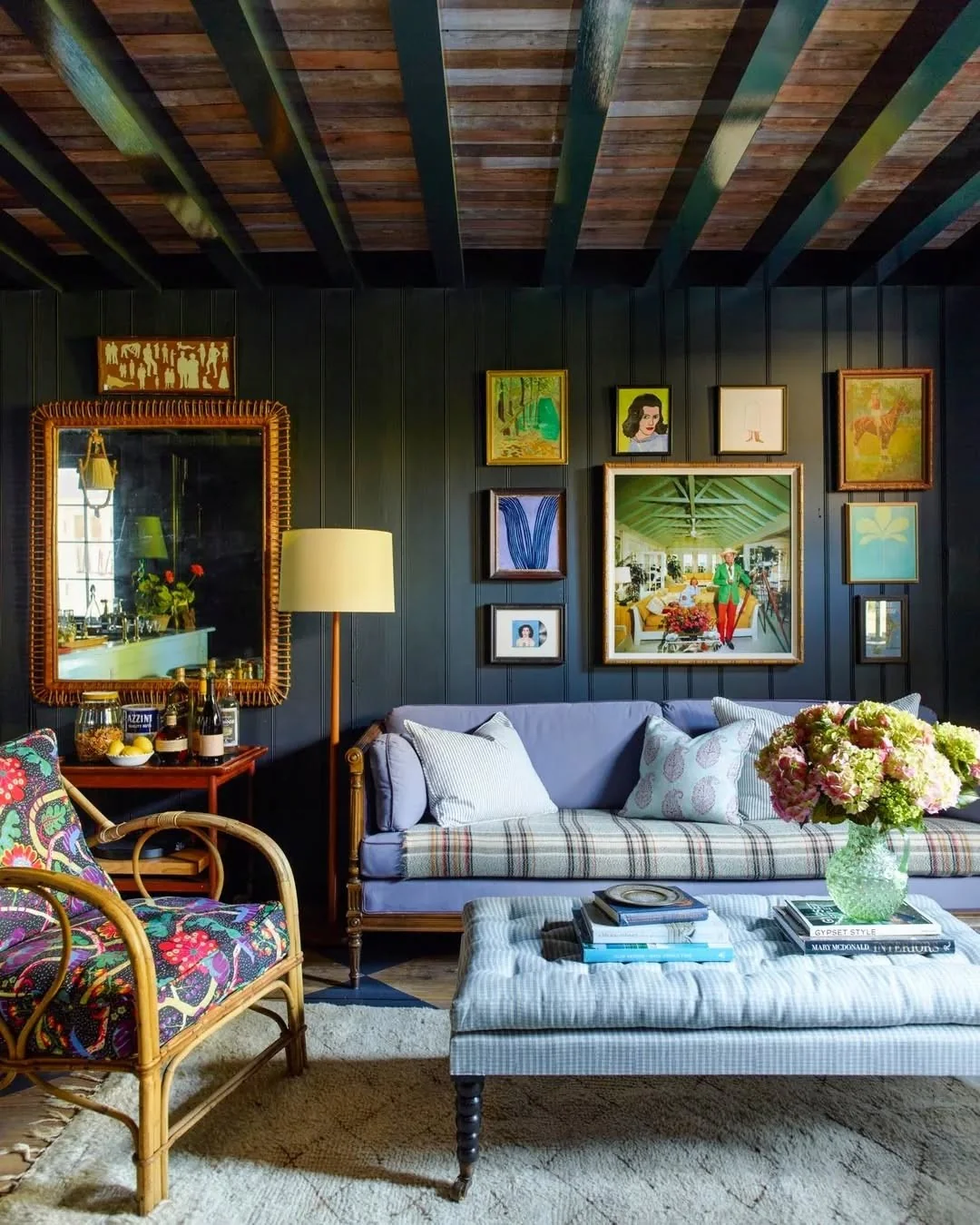 1. Art-Filled Cabin Lounge with Moody Walls & Soft Lilac Accents (Cabin Living Room Ideas)