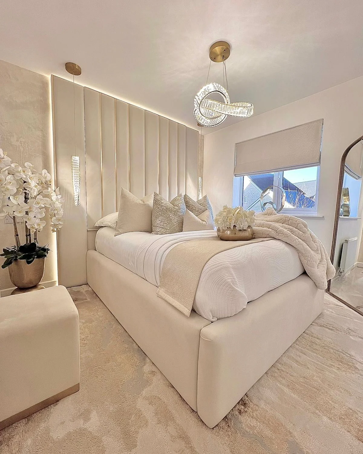 1. Elegant Neutrals with Sculptural Lighting (Spare Bedroom Ideas)