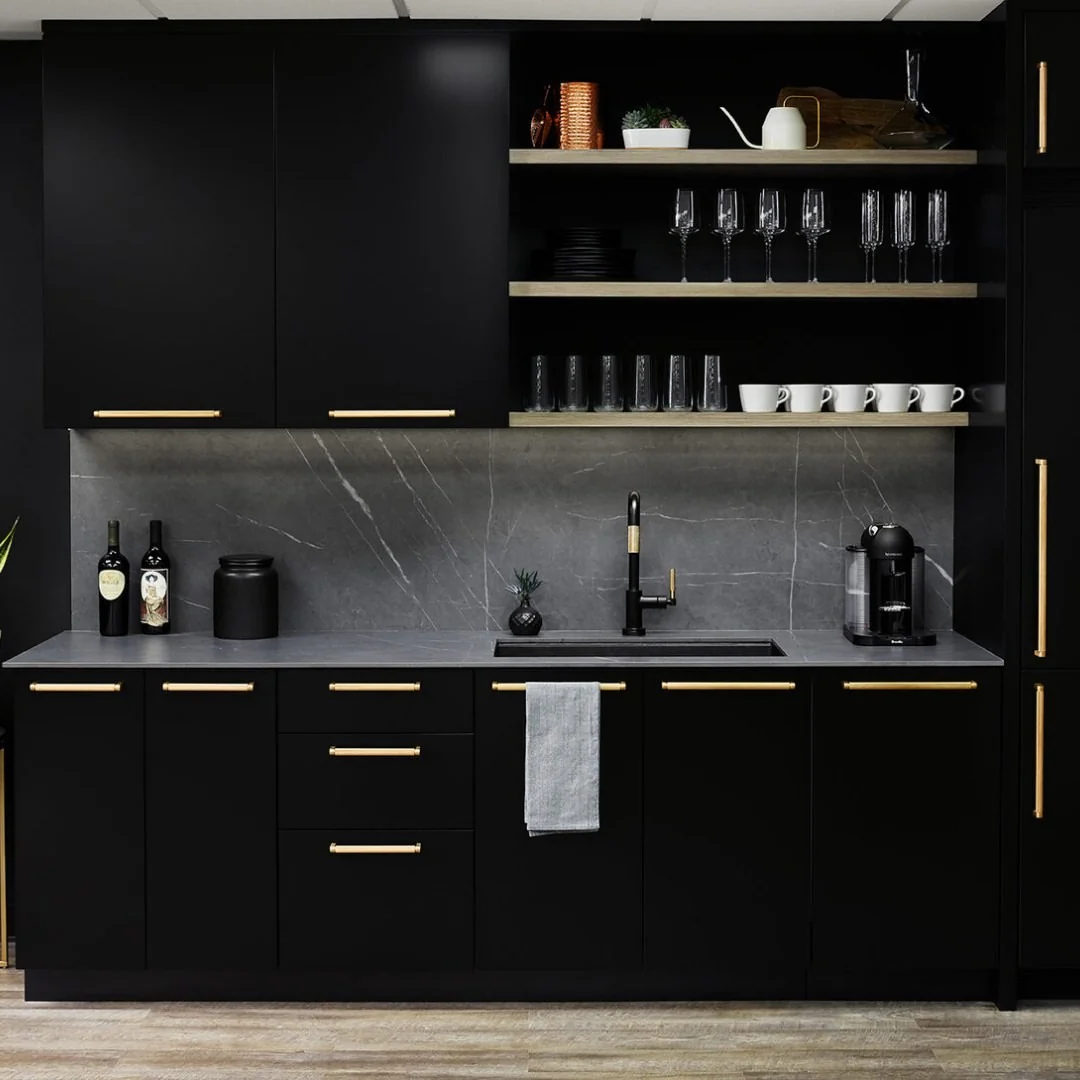 1. Modern Matte with Gold Accents (Black Cabinets Kitchen Ideas)