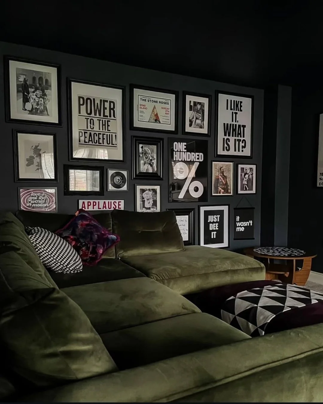 1. Eclectic Contrast with Olive Green (Black Living Room Ideas)