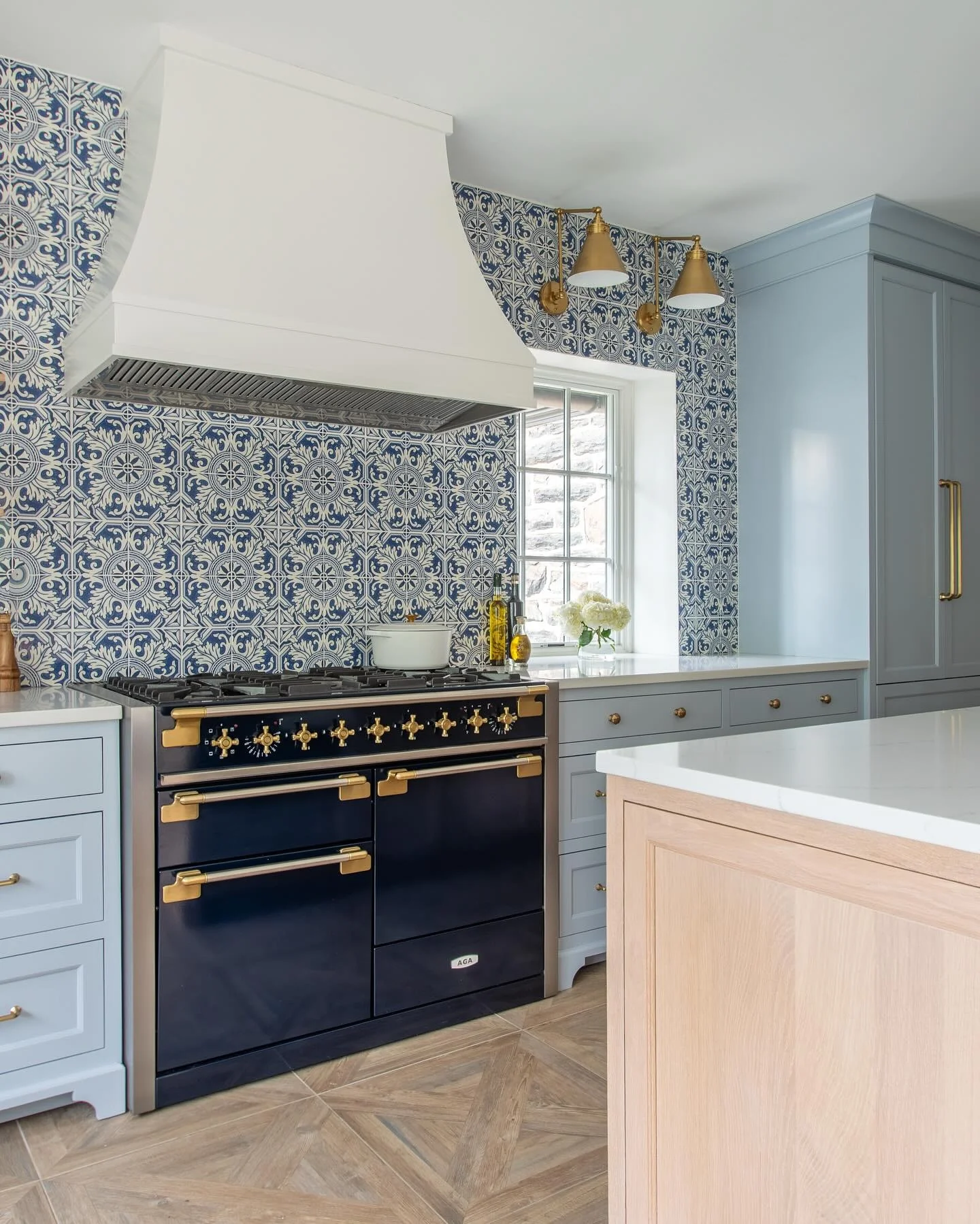 1. Timeless Elegance with Mediterranean Motifs (Blue Backsplash Kitchen Ideas)