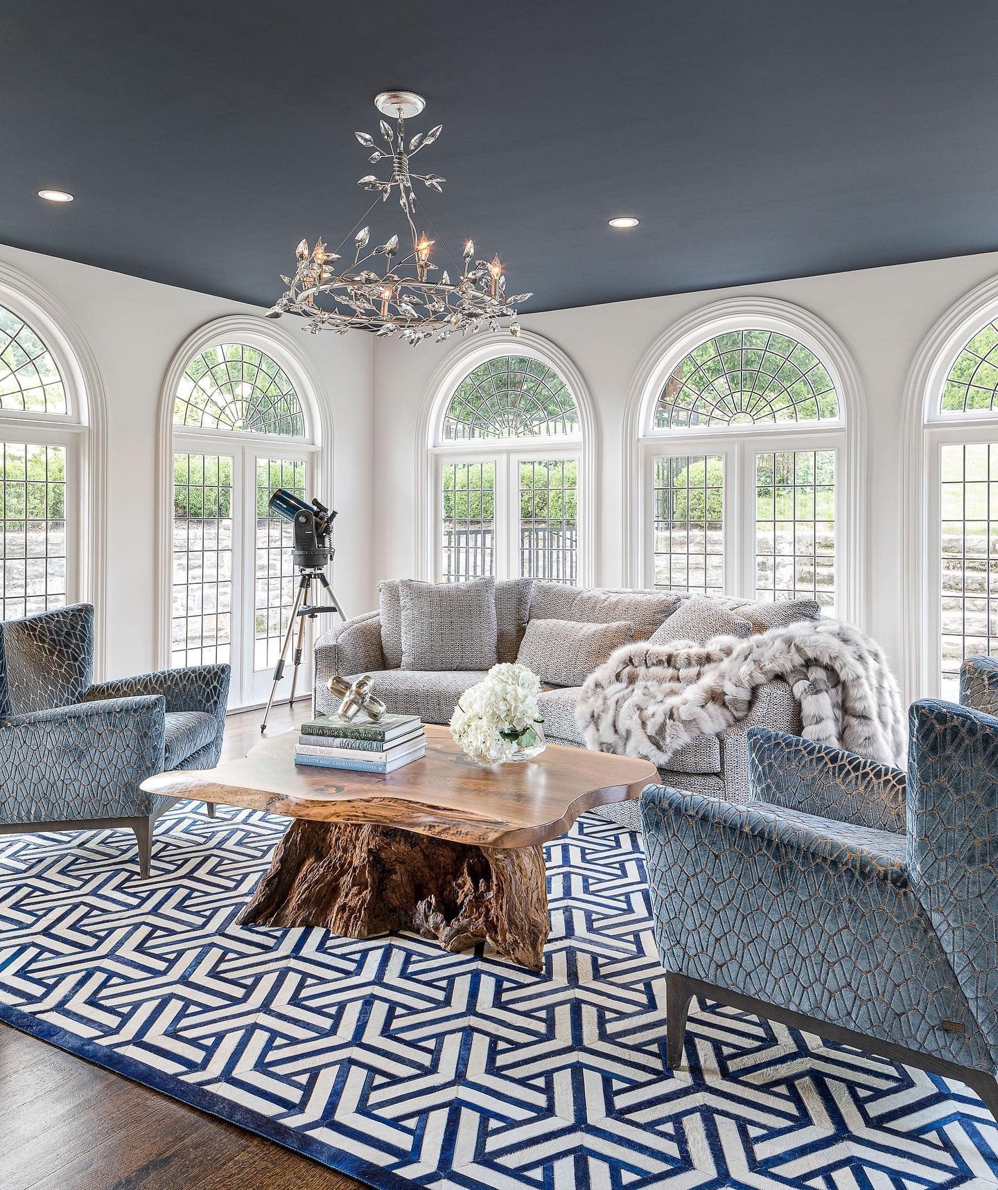 1. Dramatic Contrast with Midnight Ceiling (Living Room Chandelier Ideas)