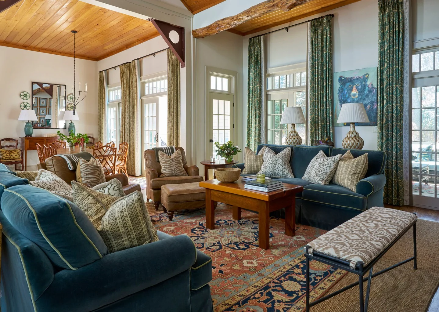 1. Refined Lodge Comfort in Deep Teal and Saddle Leather (Masculine Living Room Ideas)