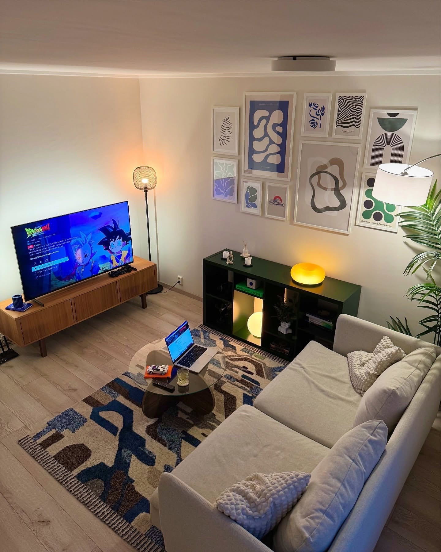 1. Contemporary Neutrals with Abstract Accents (Gallery Wall Living Room Ideas)