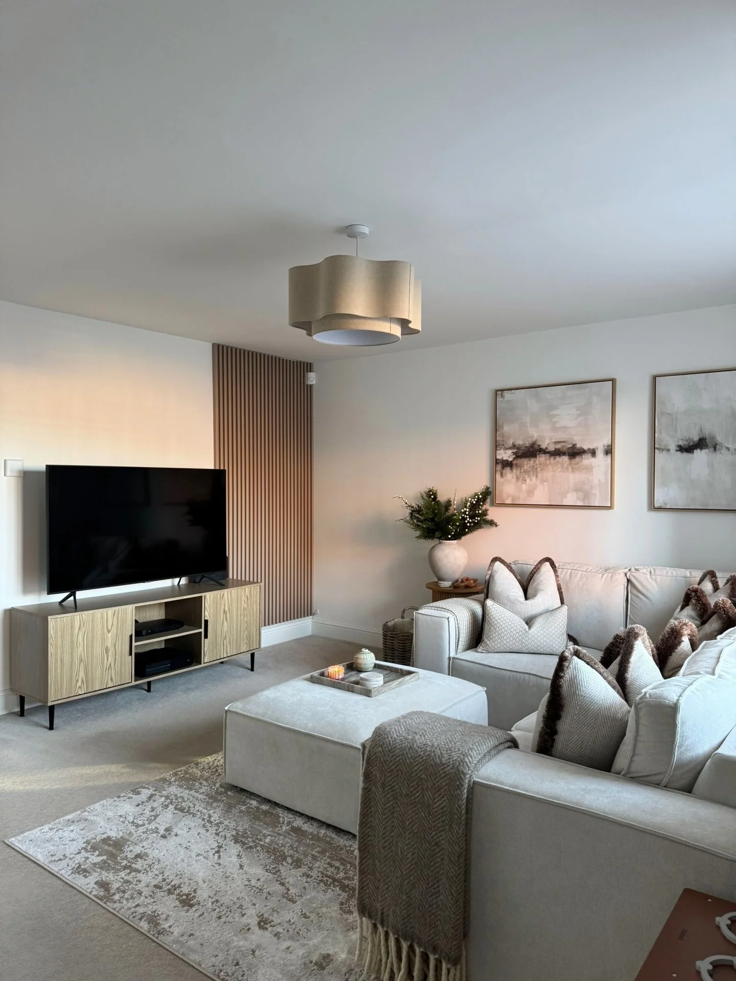 8. Contemporary Grey Living Room with Wood Slat Detail & Neutral Layers (Grey Walls Living Room Ideas)