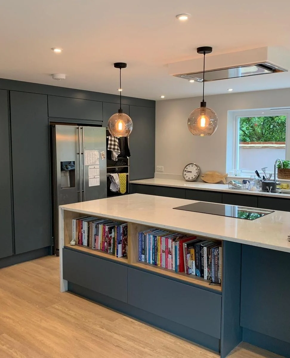 8. Charcoal-Navy Modern Kitchen With Book-Matched Island Shelving (Navy Blue Kitchen Cabinets Ideas)