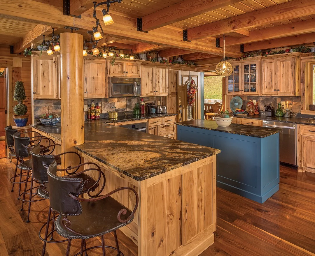 1. Warm Honey Pine Kitchen with Blue Island Contrast (Log House Kitchen Ideas)