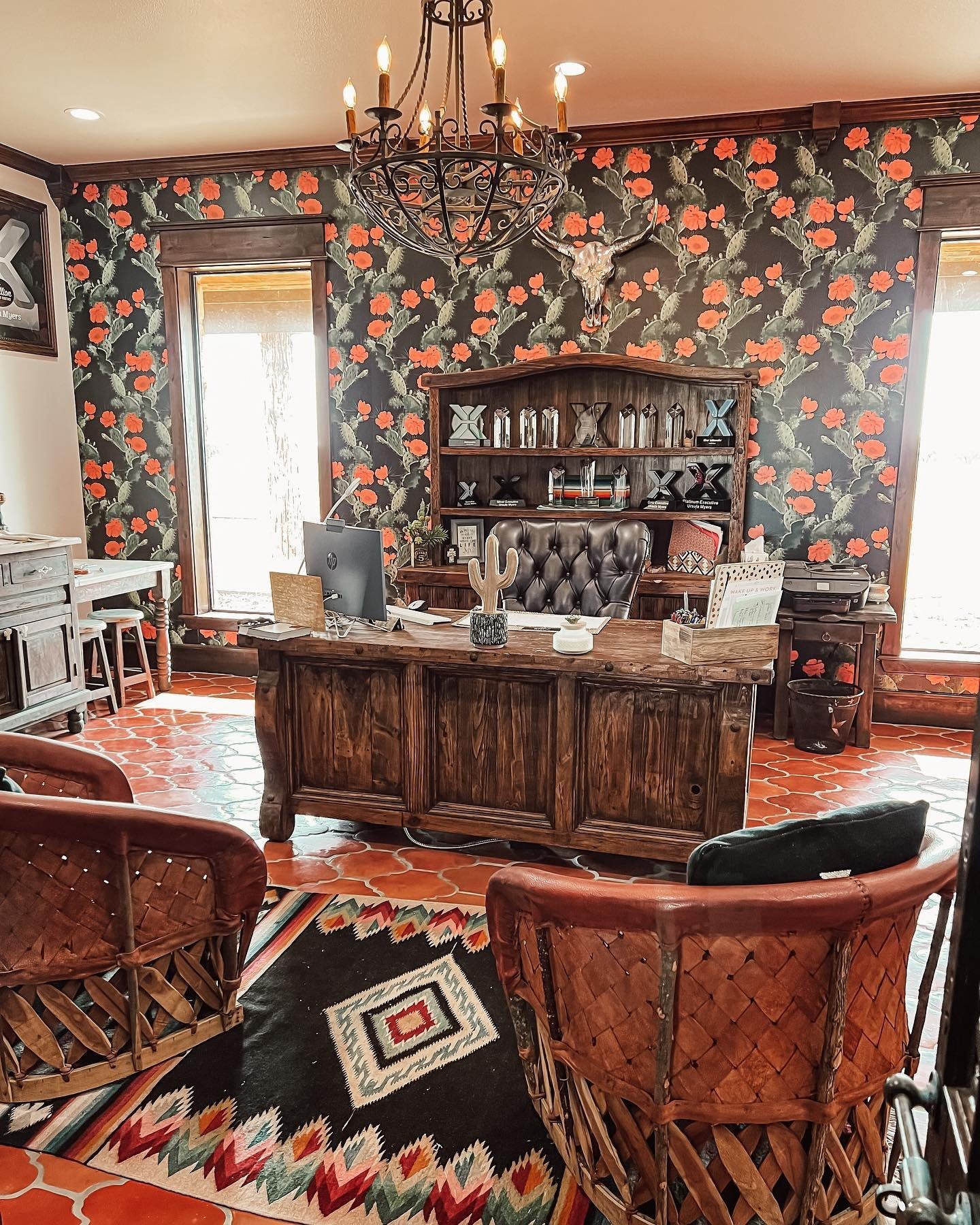 1. Cactus-Accented Western Workspace with Bold Floral Walls (Rustic Office Ideas)