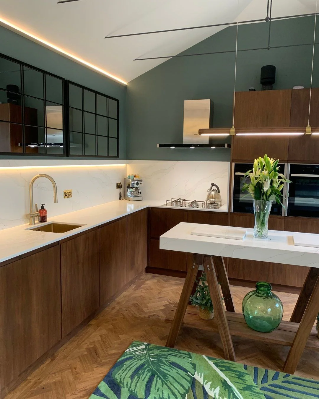 9. Walnut Slab Cabinetry + Modern Green Walls + Quartz Surfaces (Pine + Espresso Palette) (Earthy Kitchen Ideas)