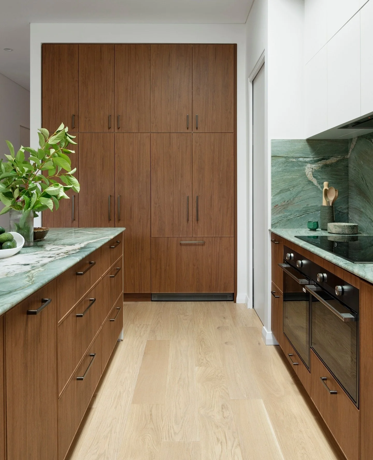 1. Walnut Wall Cabinetry + Green Marble Counters (Forest + Cocoa Palette) (Earthy Kitchen Ideas)