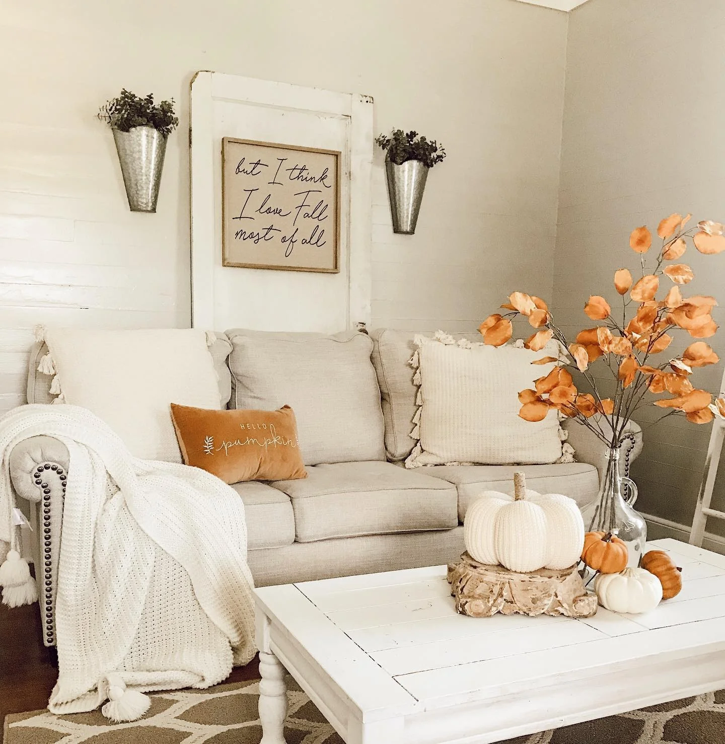 1. Soft Neutrals with Autumn Accents in Cream and Pumpkin (Fall Living Room Decorating Ideas)