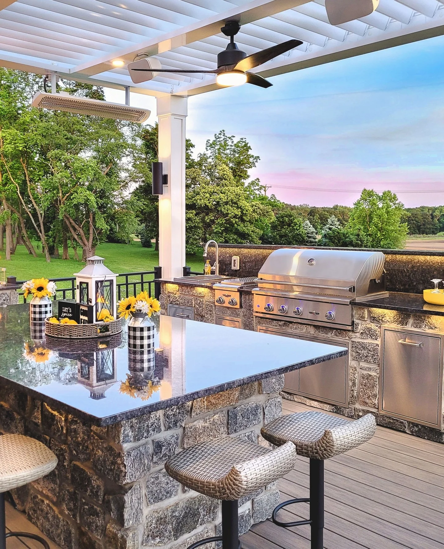 2. Pergola Outdoor Kitchen with Charcoal Gray Stone & Polished Black Granite (Small Outdoor Kitchen Ideas)