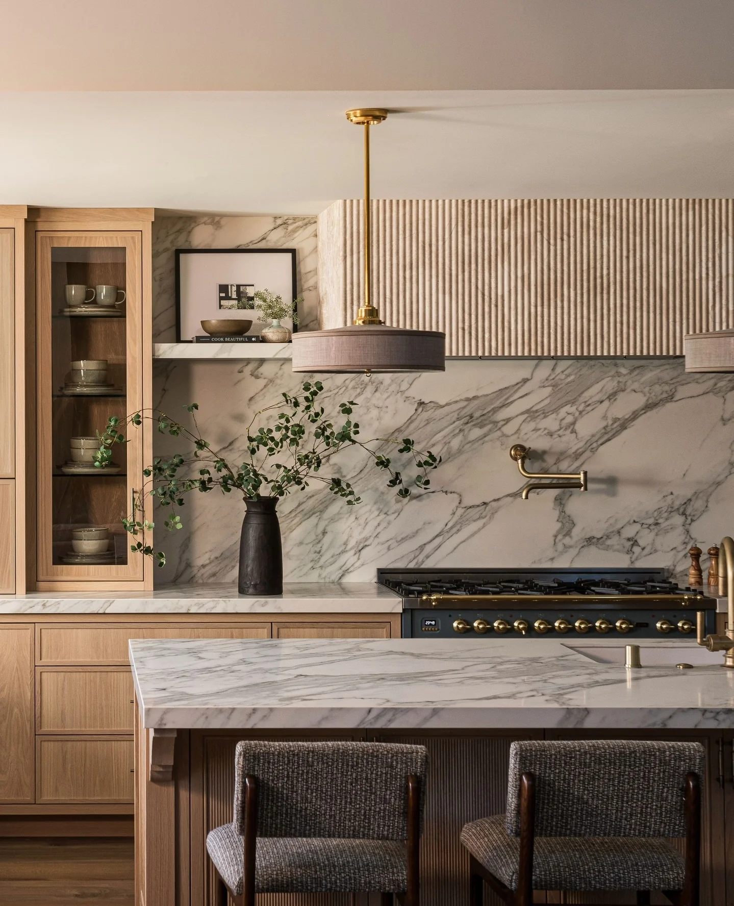 1. Warm Walnut and Veined Marble Harmony (Countertop Ideas for Kitchen)