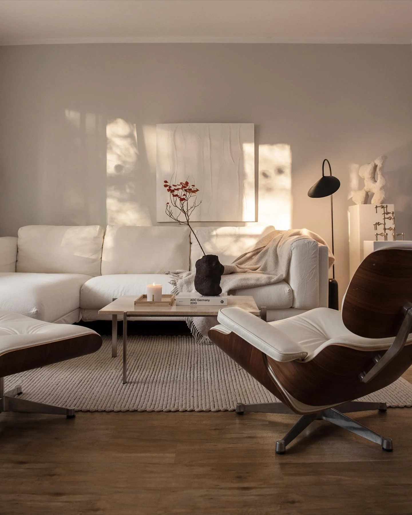 4. Cream and Walnut Contrast with Mid-Century Influence (Japandi Living Room Ideas)