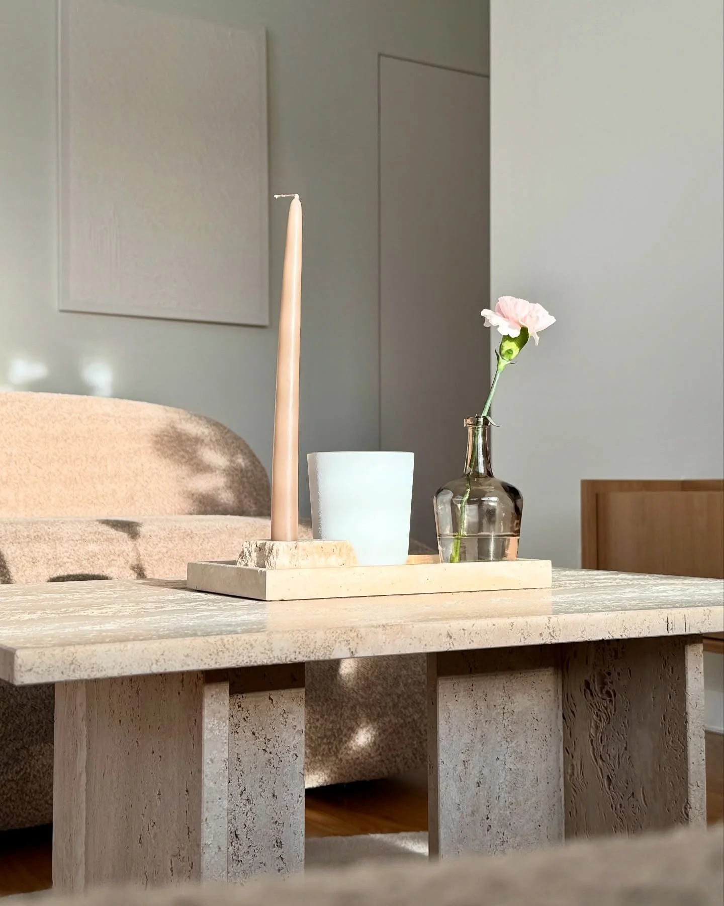 3. Stone and Blush Harmony in Natural Light (Japandi Living Room Ideas)