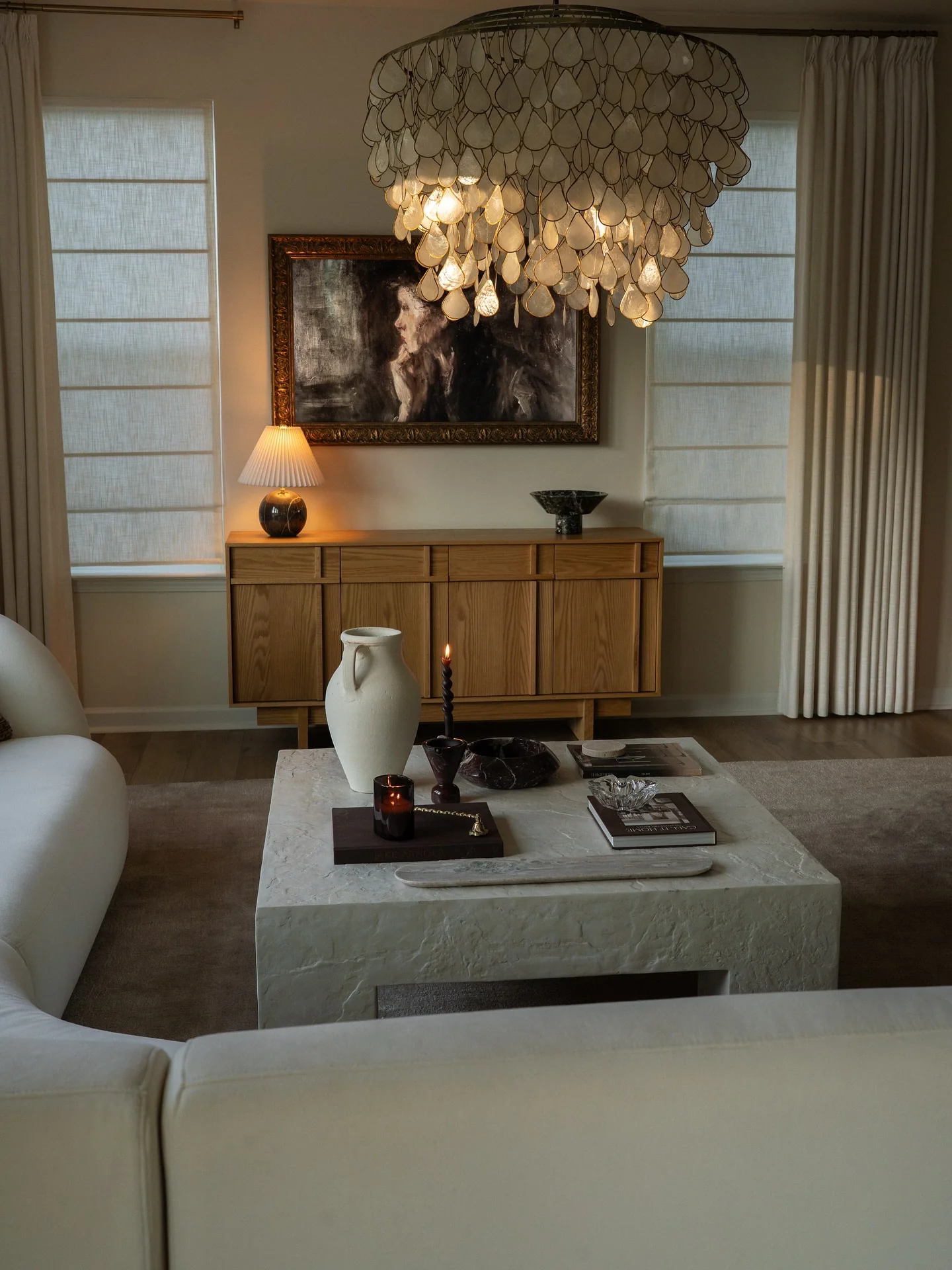 4. Soft Contemporary Room with Sculptural Lighting and Natural Tones (Open Space Living Room Ideas)