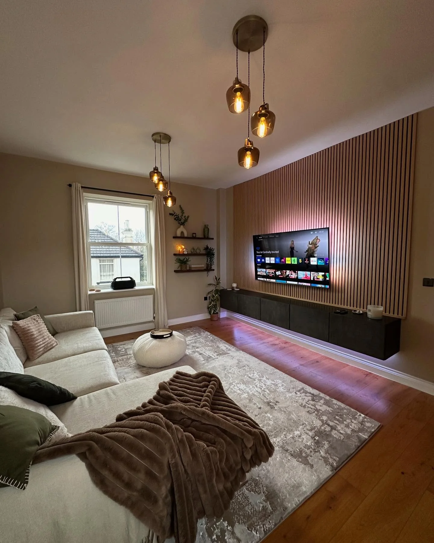 1. Modern Luxe with Vertical Texture and Ambient Glow (Dark Wood Floor Living Room Ideas)