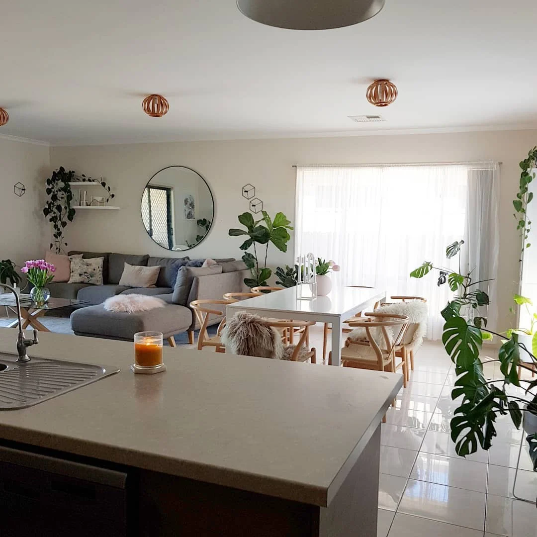 1. Scandinavian Charm with Soft Neutrals and Greenery (Living Room and Kitchen Ideas)