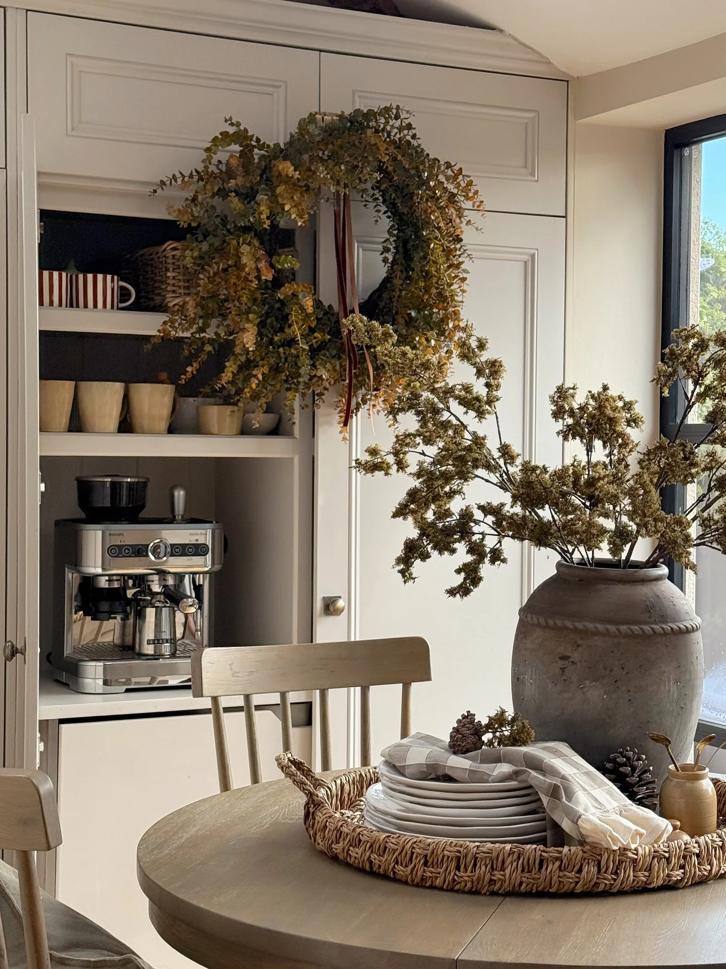 1. Rustic Charm with Autumn Accents (Small Kitchen Table Ideas)