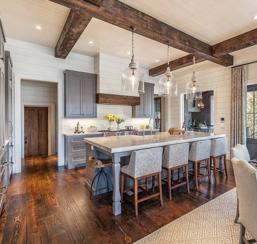 6. Classic Farmhouse Glass Pendants with Moody Gray Cabinets + Dark Wood Floors (Farmhouse Kitchen Lighting Ideas)
