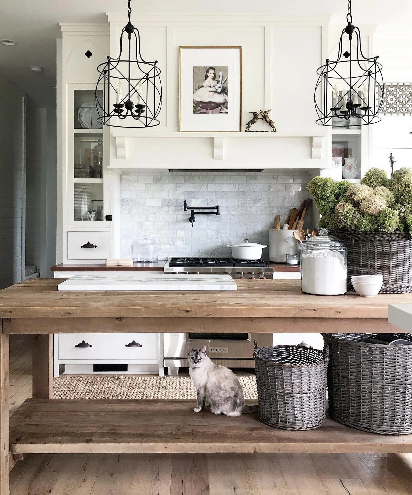 15. Open Cage Farmhouse Lanterns with White Millwork + Rustic Wood Layers (Farmhouse Kitchen Lighting Ideas)