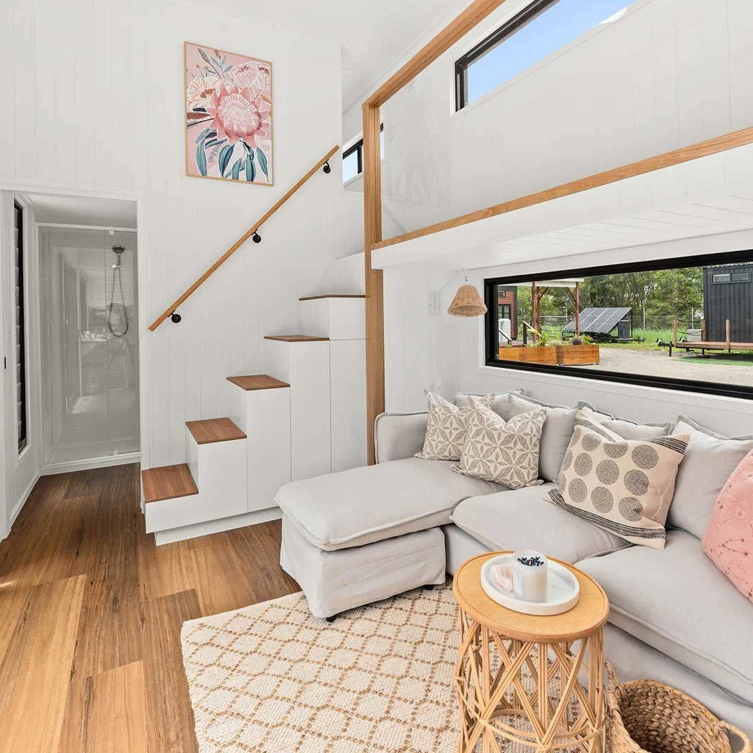 1. Modern Minimalist Loft Retreat in White and Wood (Tiny House Living Room Ideas)