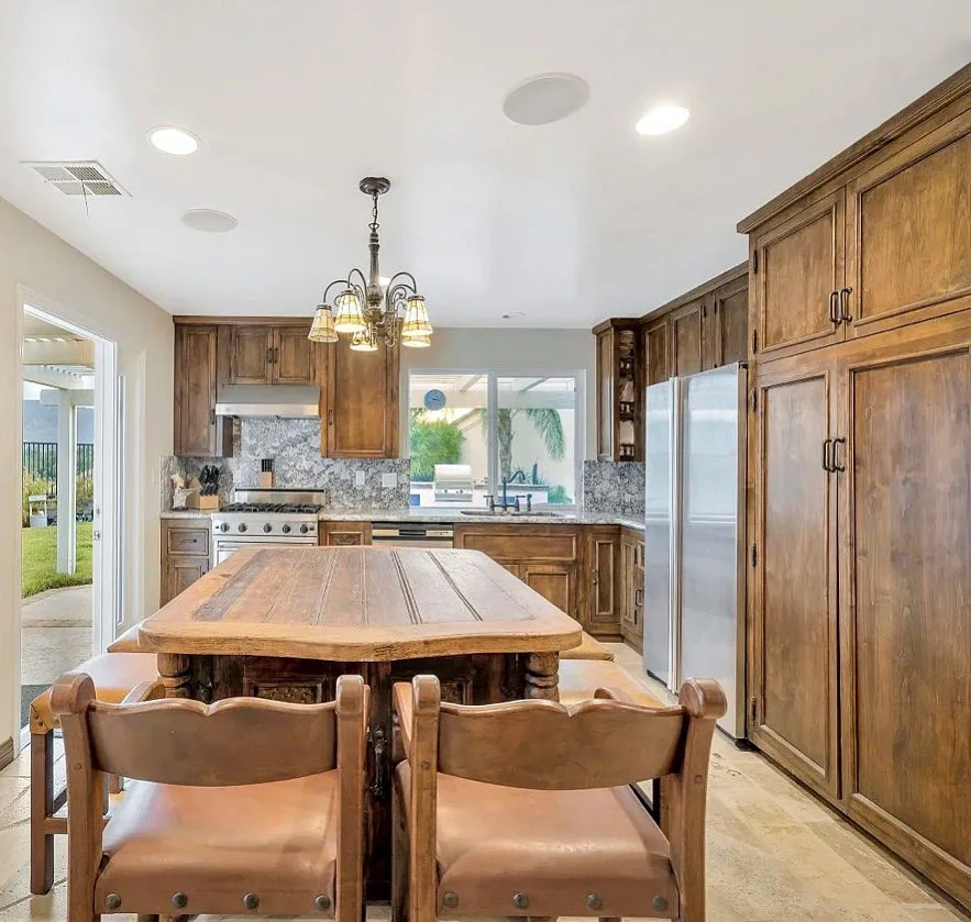 1. Old-World Spanish Kitchen with Warm Wood Tones (Spanish Style Kitchen Ideas)