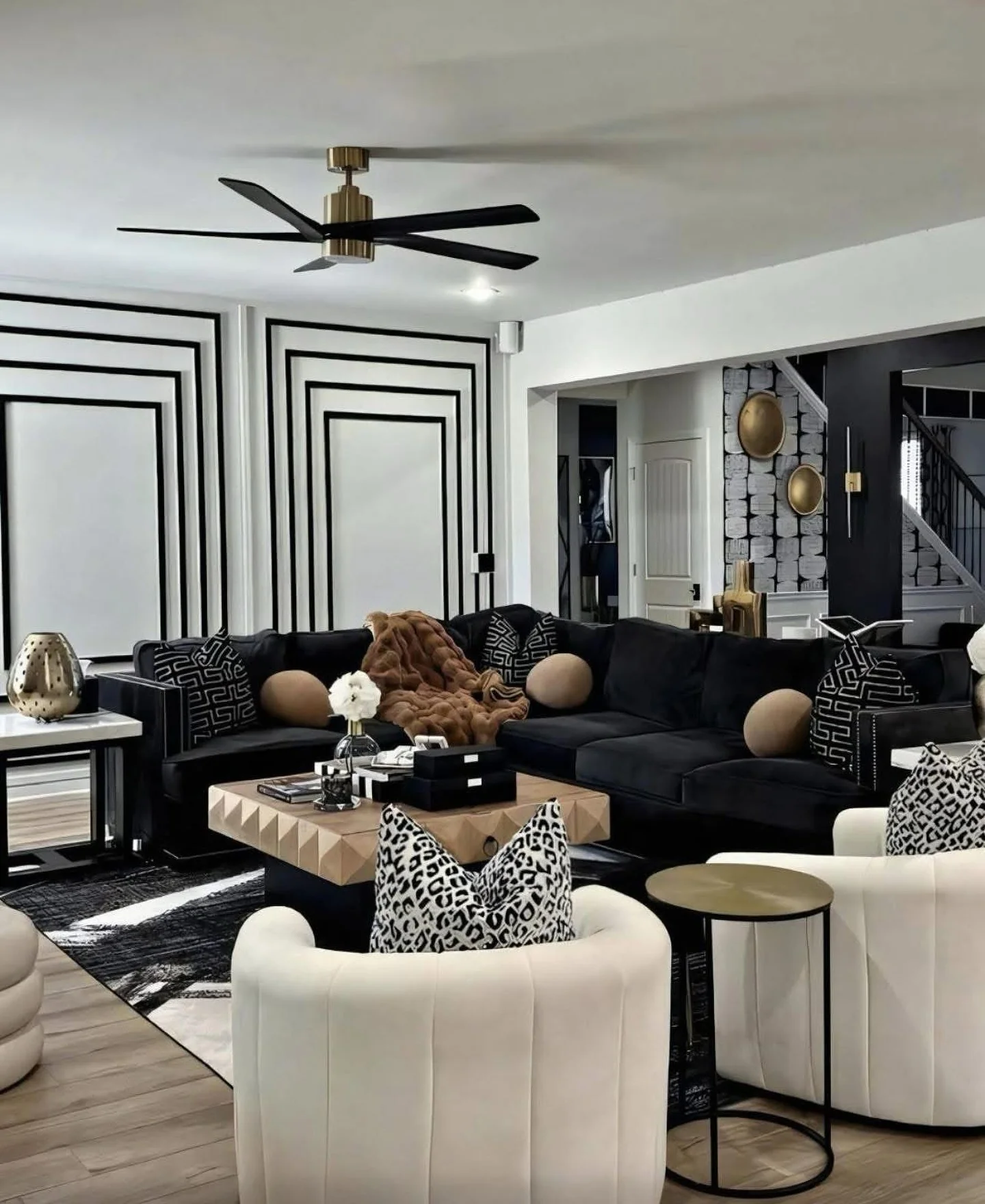 13. Graphic Black-and-White Living Room with Soft Brown Accents (Brown and Black Living Room Ideas)