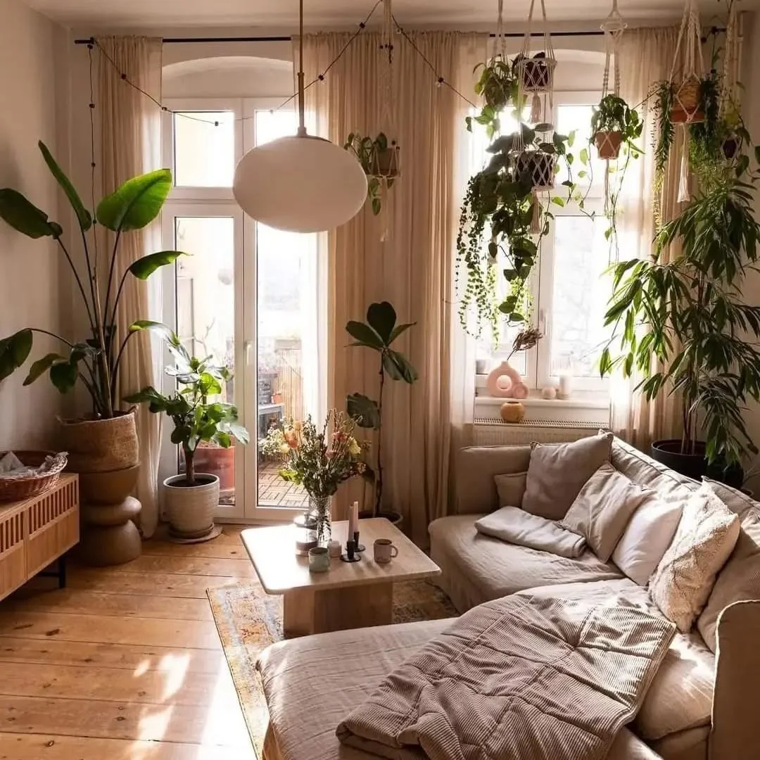 1. Earthy Plant-Filled Boho Retreat (Boho Living Room Ideas)