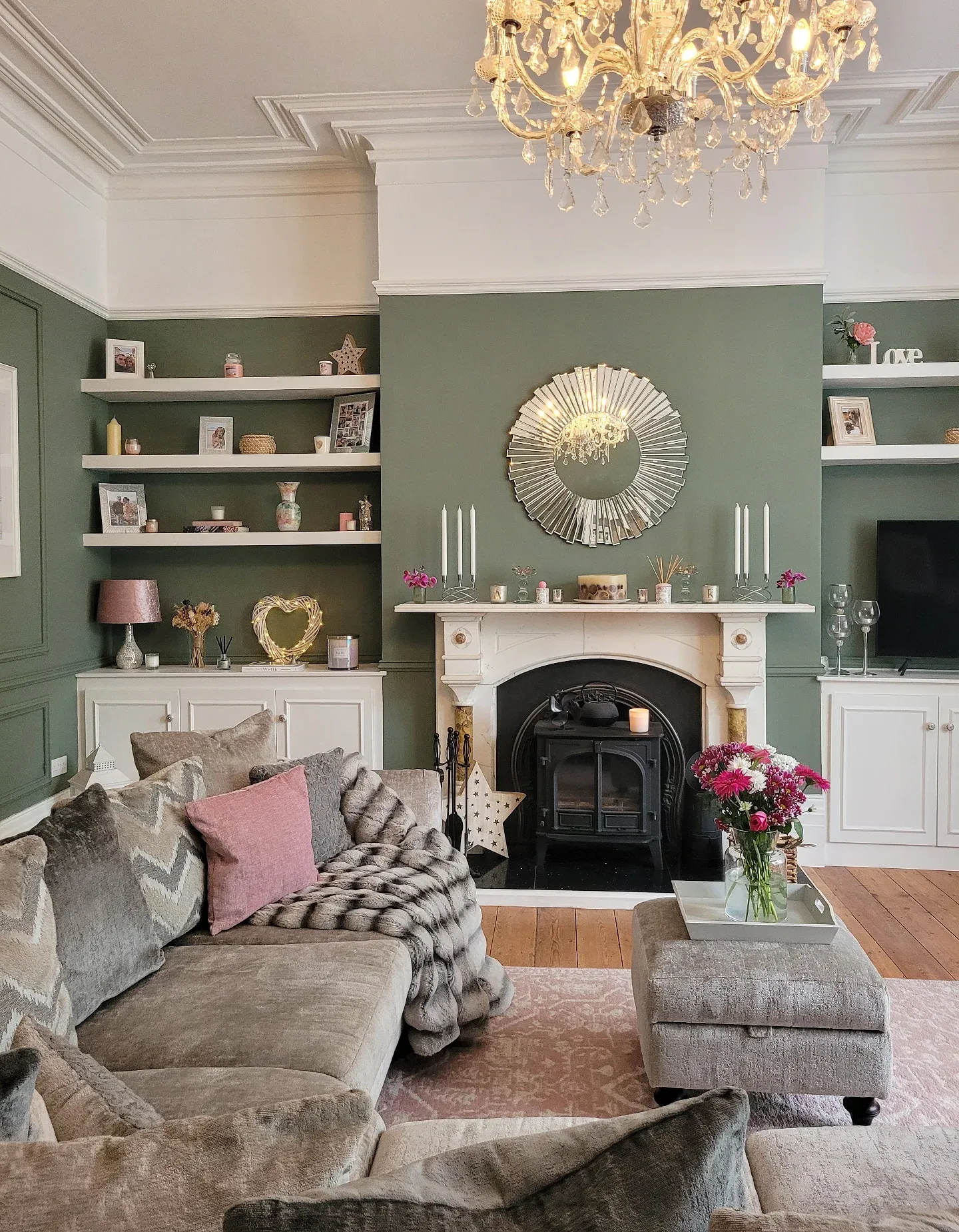 13. Sage Green Feature Wall With Crystal Chandelier (Victorian Living Room Ideas)