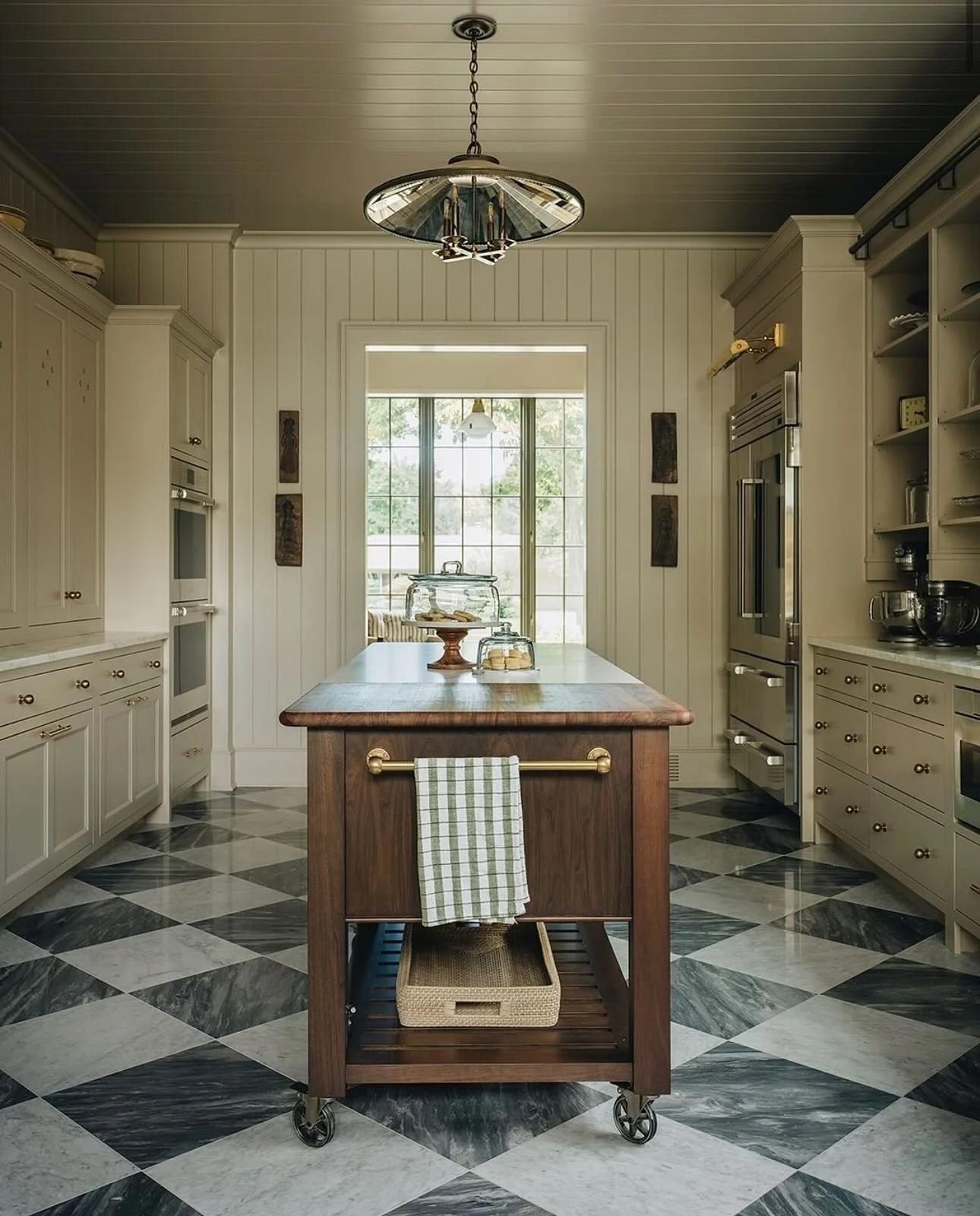 1. Checkered Elegance with a Rolling Island (Vintage Kitchen Ideas)